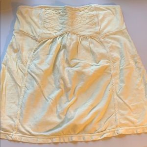 Pale yellow strapless top